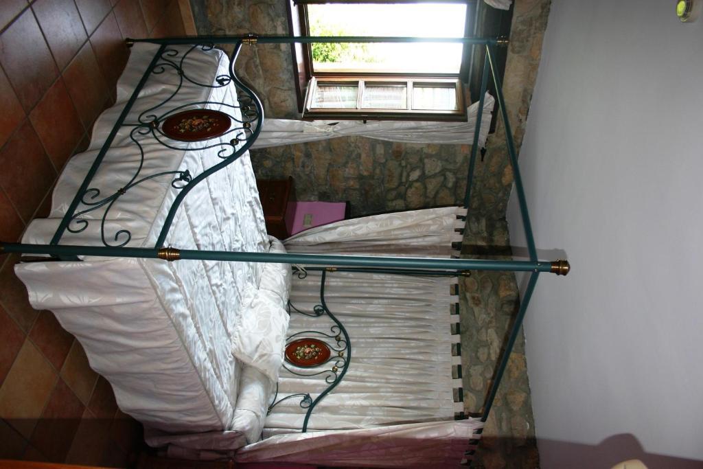 Posada La Venta De Quijas Cameră foto