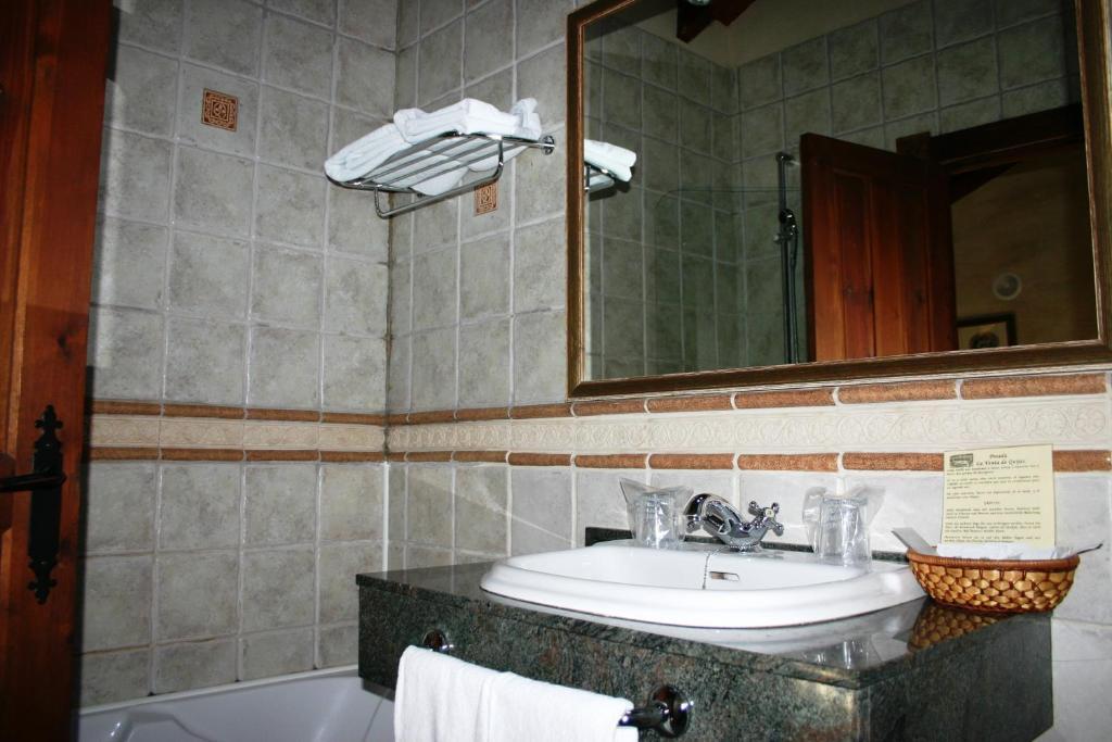 Posada La Venta De Quijas Cameră foto